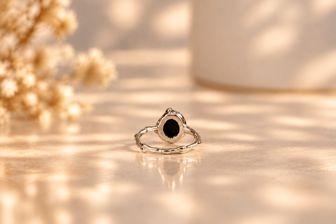 Handmade organic sterling silver ring with a single black onyx oval cabochon, Rooz Jewellery