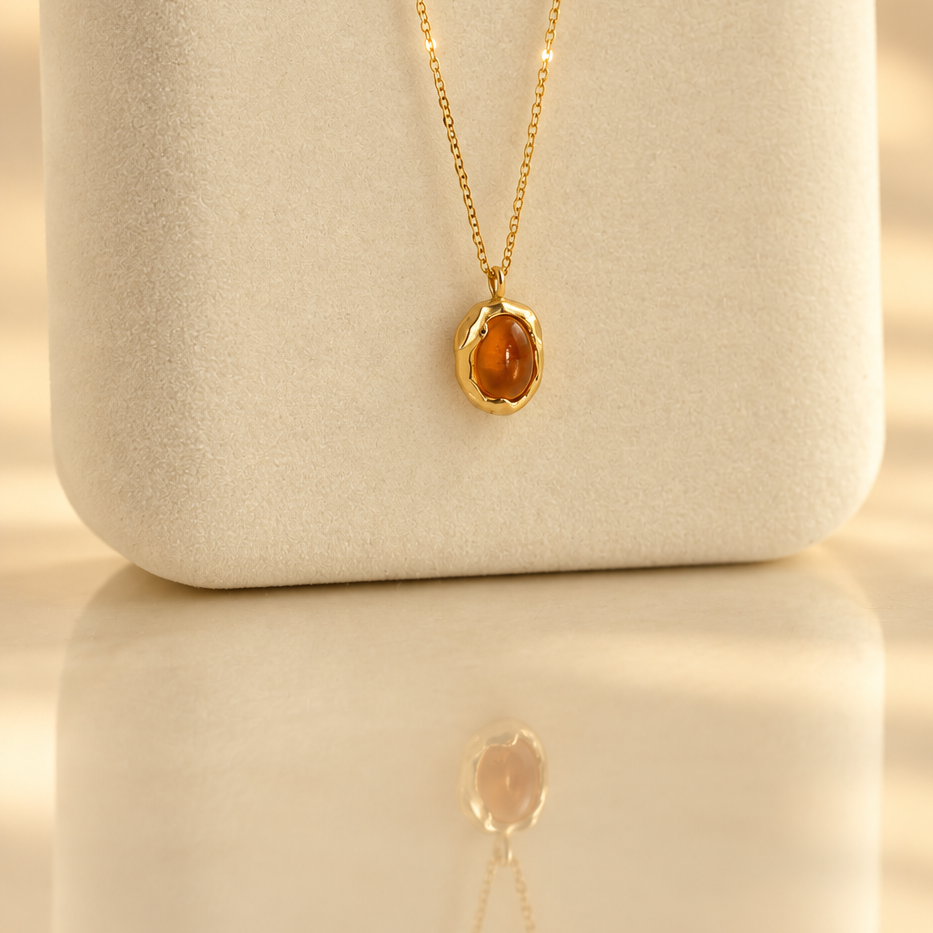 Handmade organic solid 10k gold pendant with a yellow oval citrine cabochon on a gold chain, Rooz Jewellery Toronto