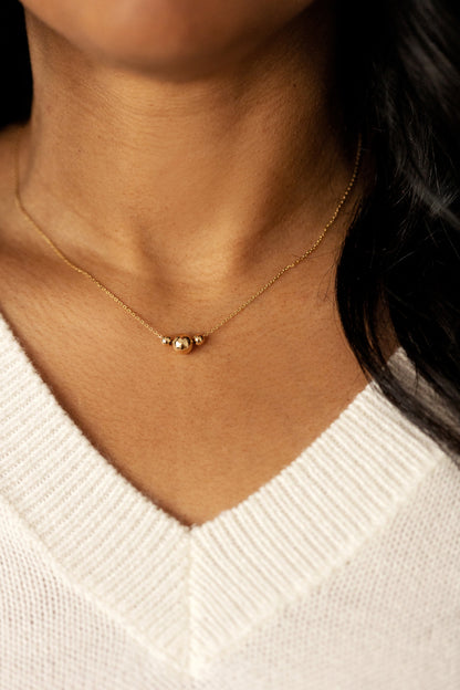 Sliding Gold balls necklace