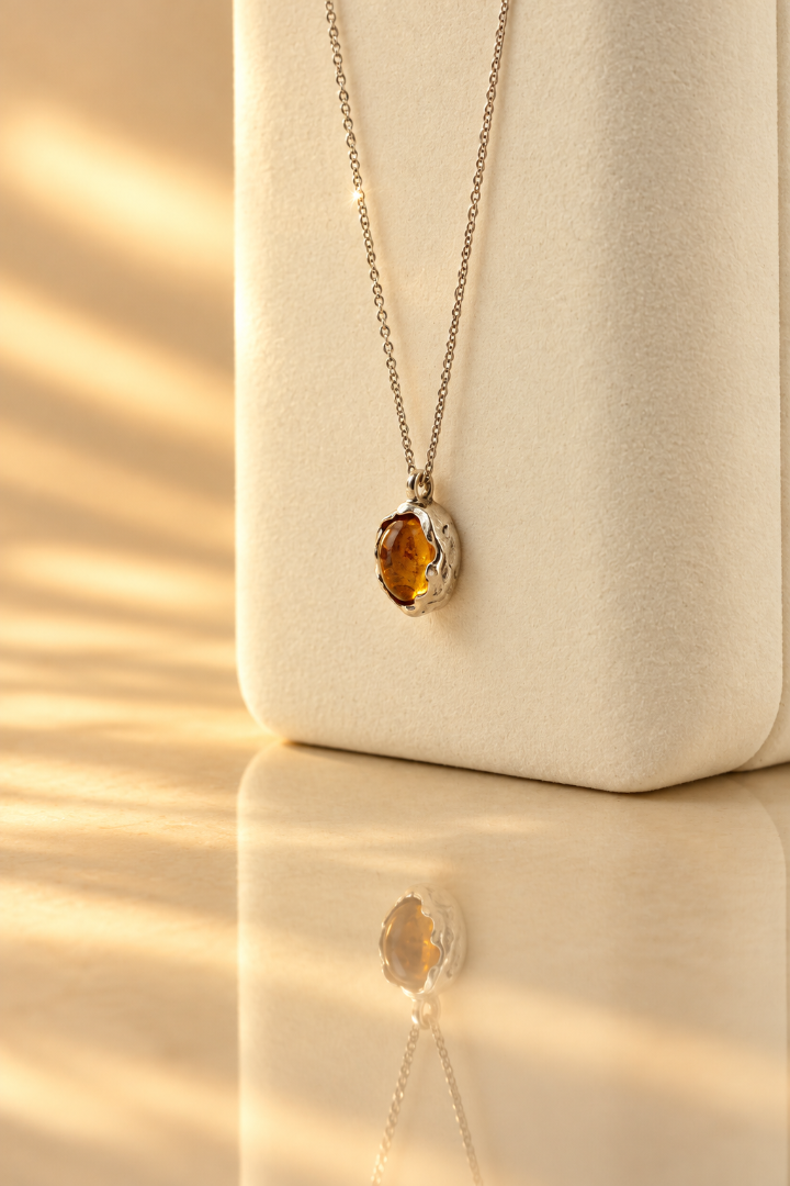 Handmade organic sterling silver pendant with a golden yellow oval citrine cabochon, Rooz Jewellery Toronto