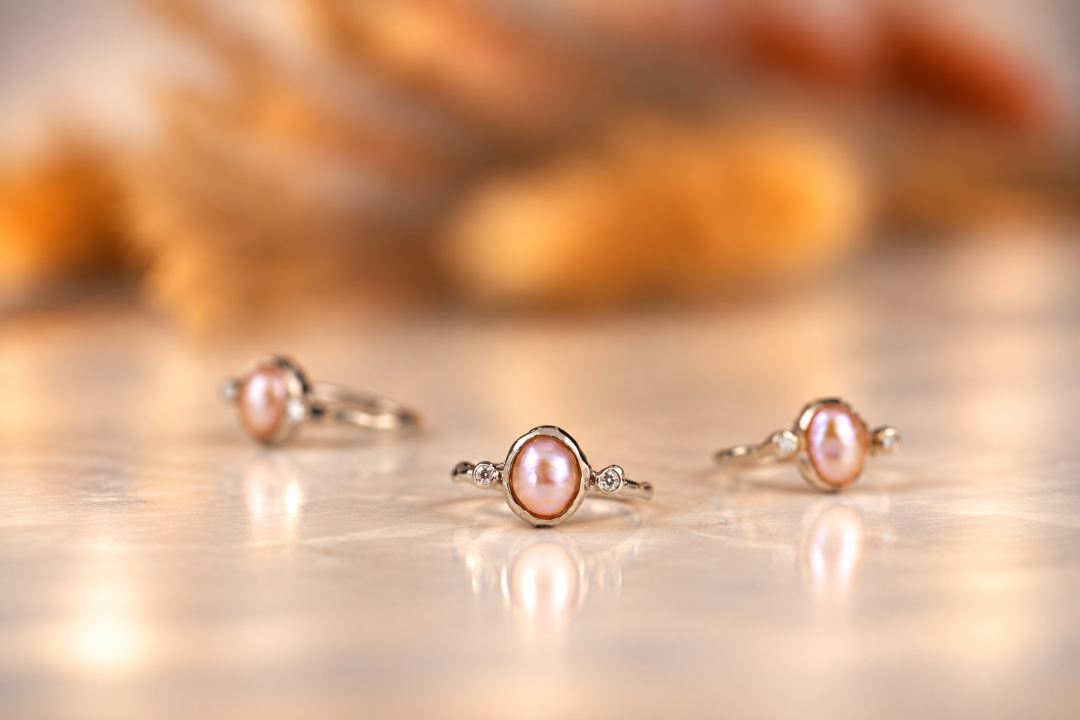 Organic sterling silver ring with a lustrous pearl and small lab-grown diamonds, handmade by Rooz Jewellery in Toronto