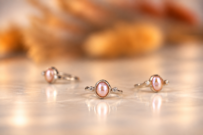 Organic sterling silver ring with a lustrous pearl and small lab-grown diamonds, handmade by Rooz Jewellery in Toronto
