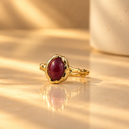 Handmade organic 10k yellow gold ring with a red oval ruby cabochon, Rooz Jewellery Toronto