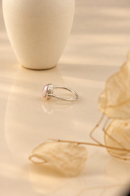 Organic sterling silver ring with a lustrous pearl and small lab-grown diamonds, handmade by Rooz Jewellery in Toronto