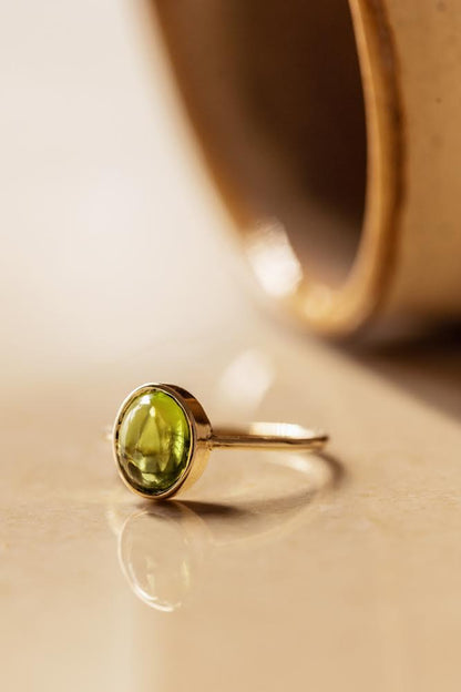 Natural Cabochon Oval Peridot in 10k Solid Gold Ring