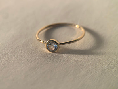 Round Aquamarine Bezel-Set Gold Ring