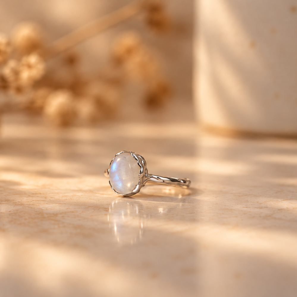 Handmade organic sterling silver ring with a glowing oval moonstone cabochon, Rooz Jewellery