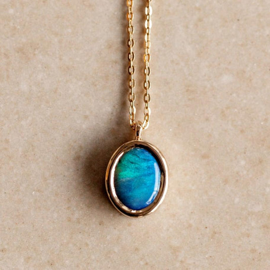 Ethiopian Opal in Solid 10k yellow Gold Pendant