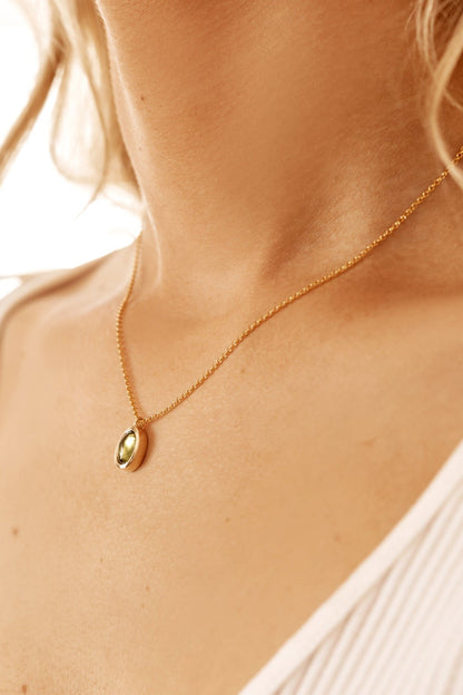 Peridot in Solid 10k yellow Gold Pendant