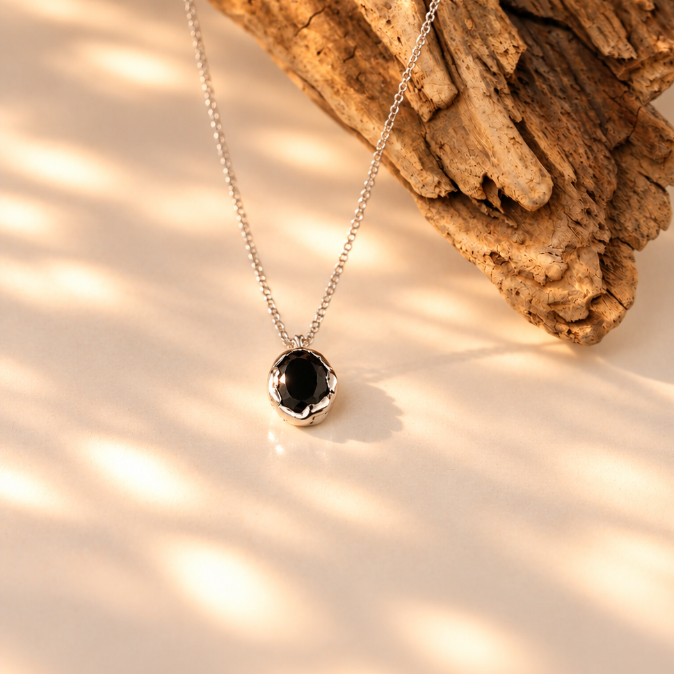 Handmade organic sterling silver pendant with a black oval faceted onyx on a silver chain, Rooz Jewellery Toronto