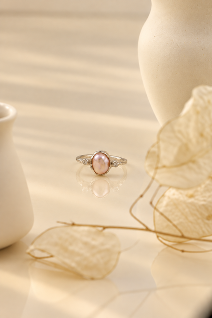 Organic sterling silver ring with a lustrous pearl and small lab-grown diamonds, handmade by Rooz Jewellery in Toronto