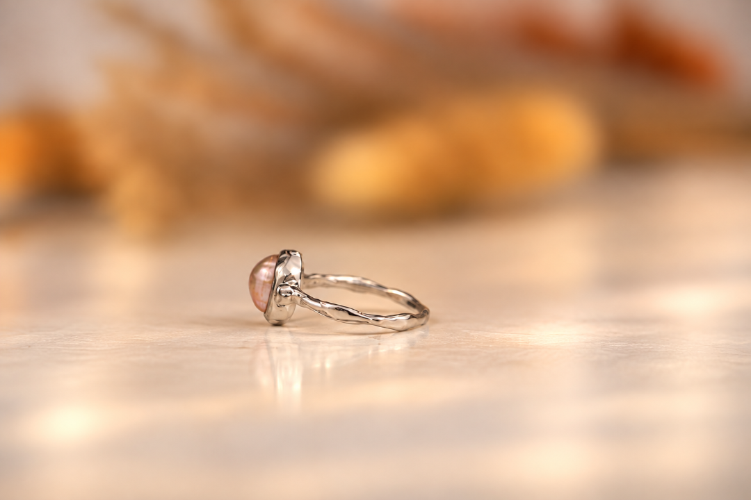 Organic sterling silver ring with a lustrous pearl and small lab-grown diamonds, handmade by Rooz Jewellery in Toronto