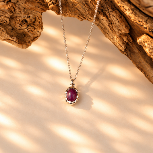 Handmade organic sterling silver pendant with a red ruby oval cabochon on a silver chain, Rooz Jewellery Toronto
