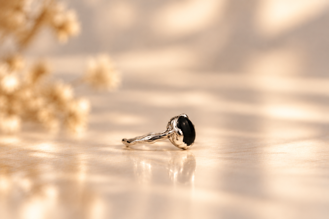 Handmade organic sterling silver ring with a single black onyx oval cabochon, Rooz Jewellery