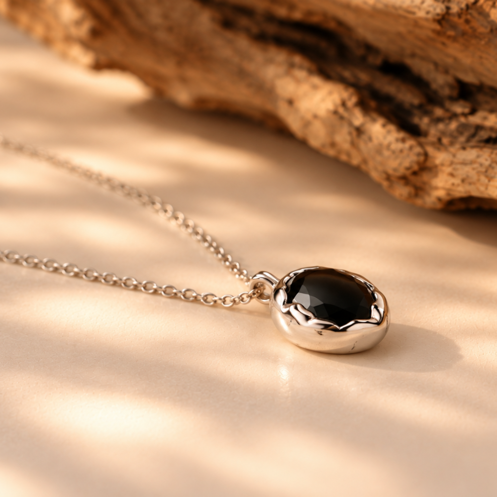 Handmade organic sterling silver pendant with a black oval faceted onyx on a silver chain, Rooz Jewellery Toronto