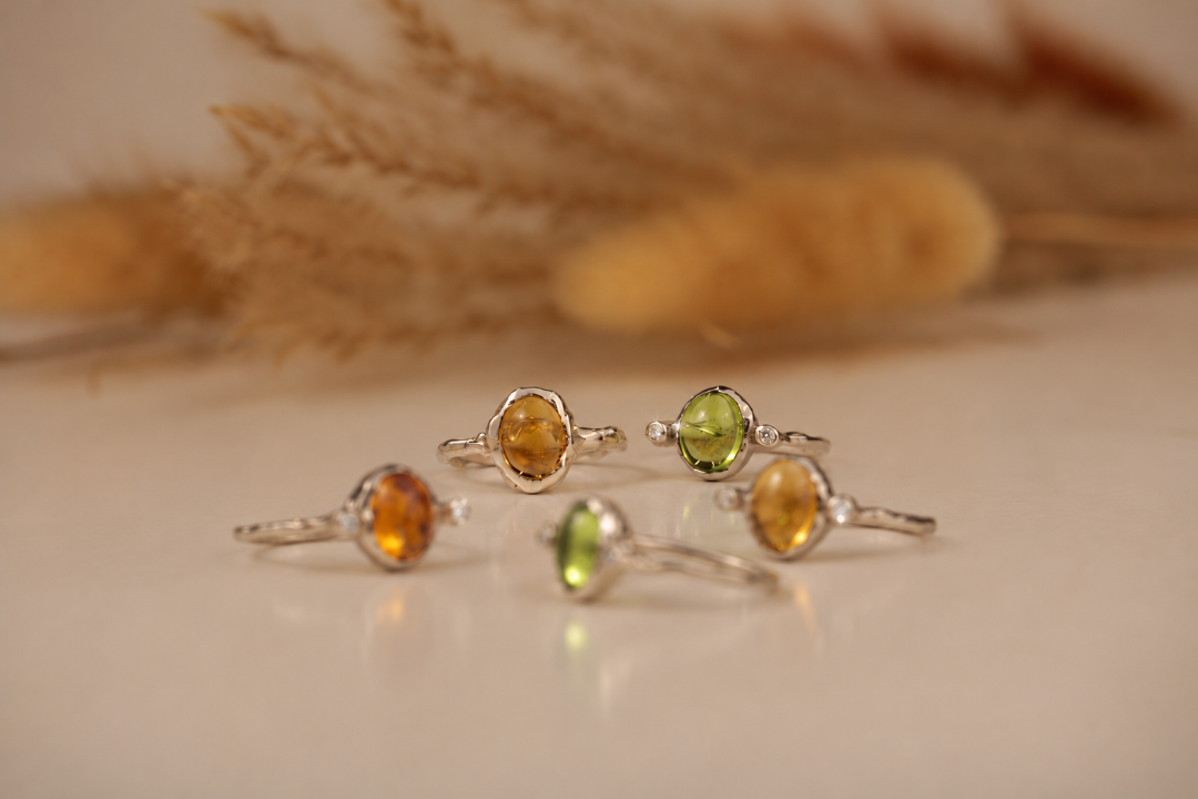 Some Handmade organic sterling silver rings with a warm golden citrine and peridot oval cabochon stones, Rooz Jewellery