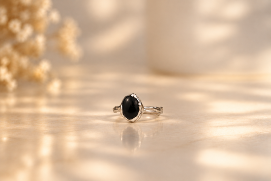 Handmade organic sterling silver ring with a single black onyx oval cabochon, Rooz Jewellery