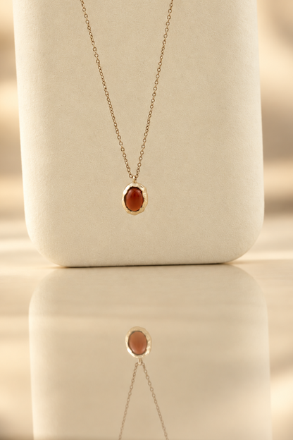 Handmade organic sterling silver pendant with a wine-red oval garnet cabochon, Rooz Jewellery Toronto