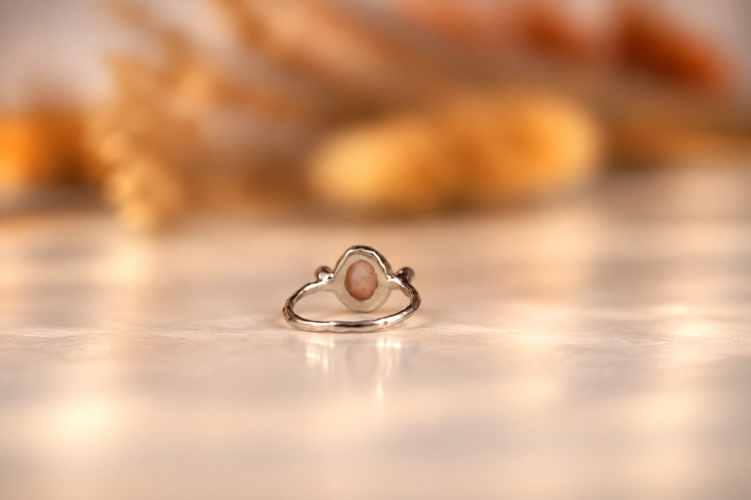 Organic sterling silver ring with a lustrous pearl and small lab-grown diamonds, handmade by Rooz Jewellery in Toronto