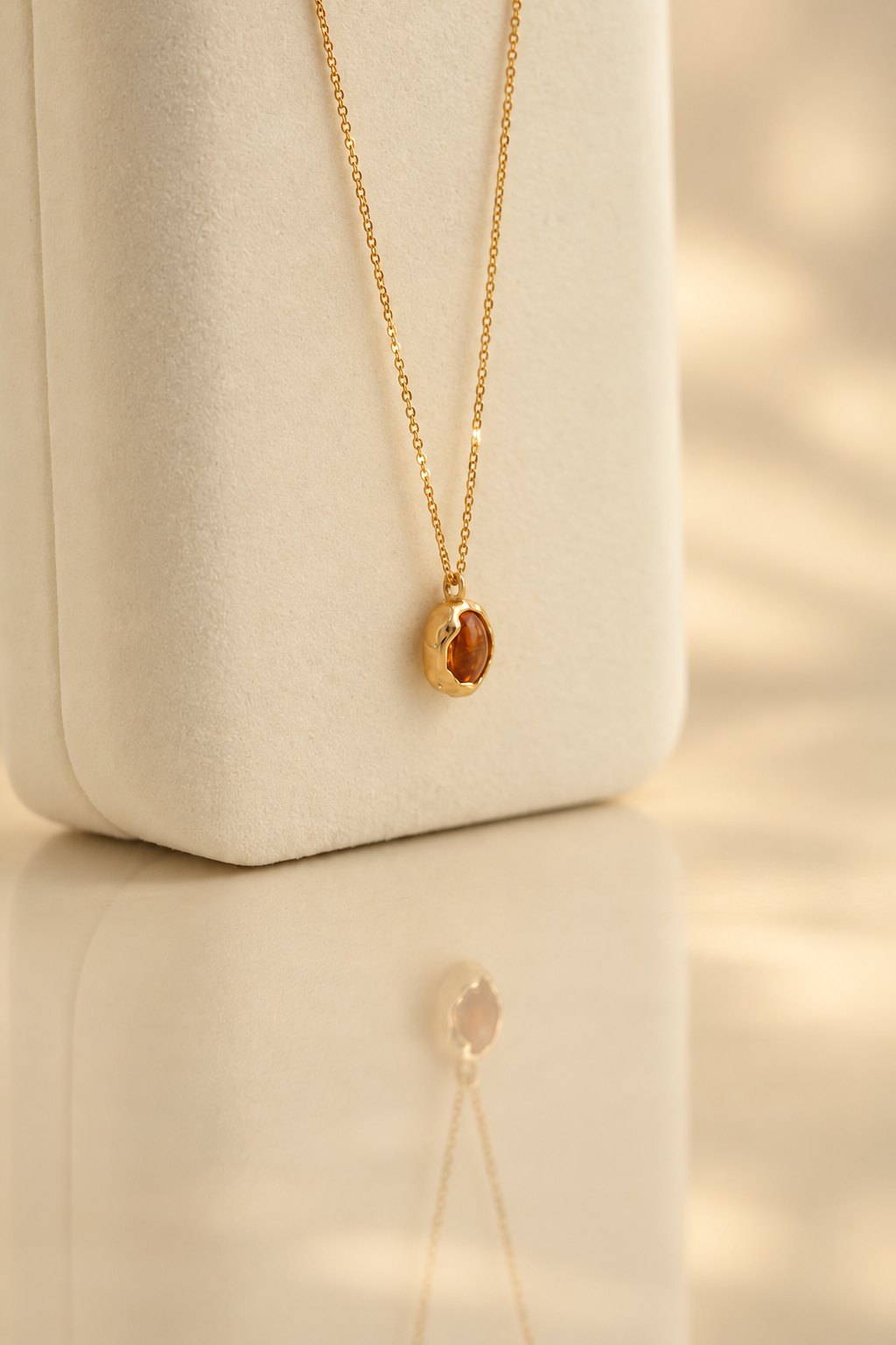 Handmade organic solid 10k gold pendant with a yellow oval citrine cabochon on a gold chain, Rooz Jewellery Toronto